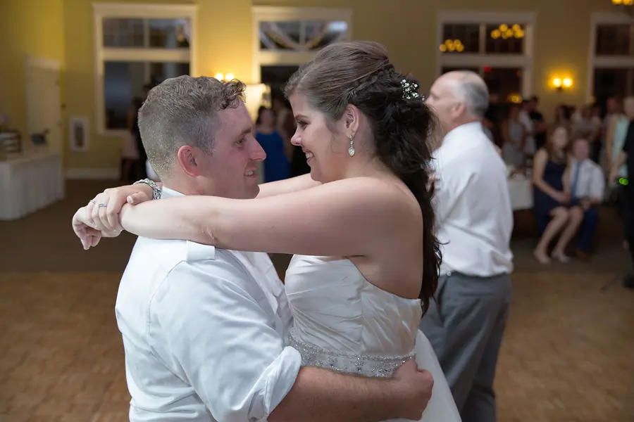 Reception dancing with colored uplights